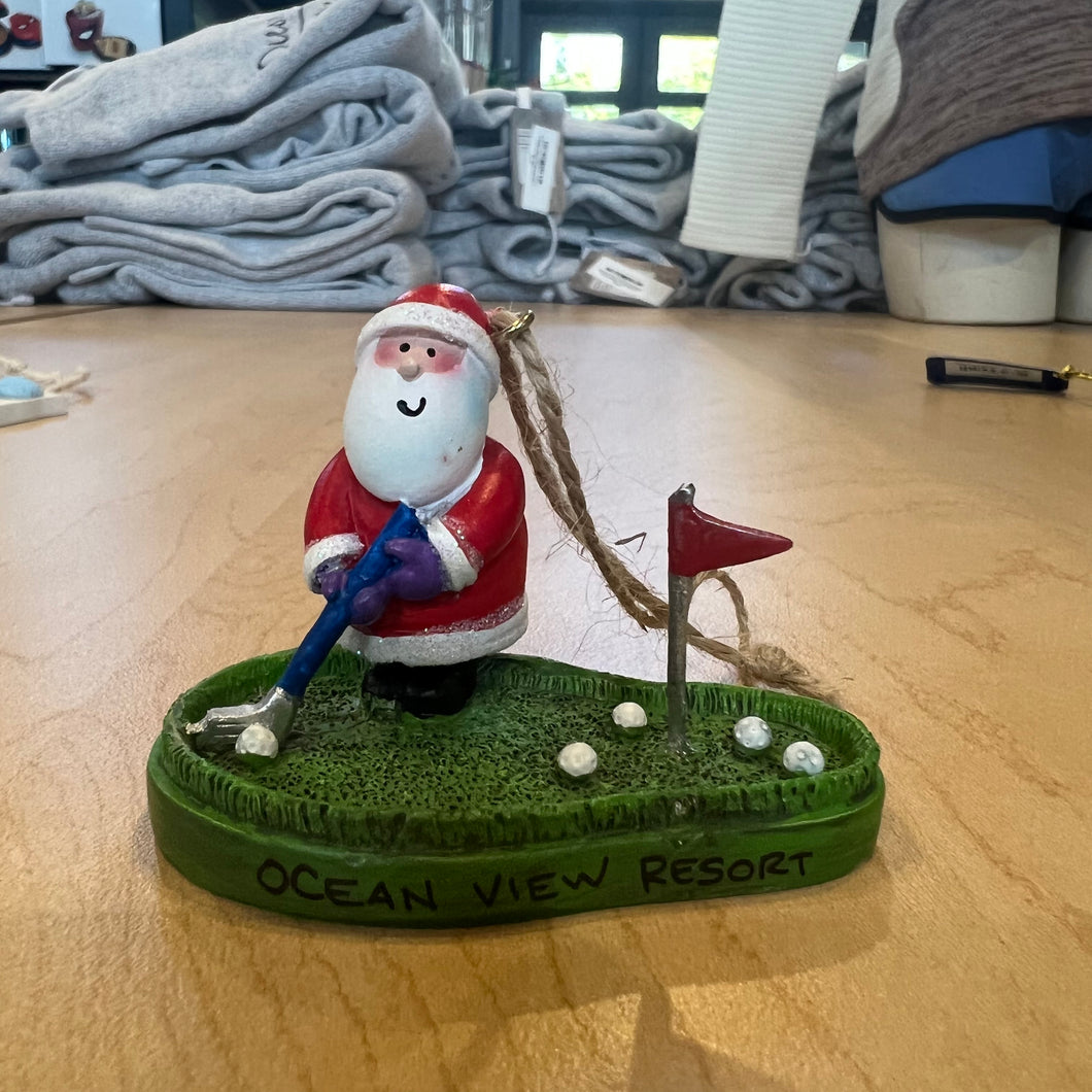 RES SANTA ON A PUTTING GREEN
